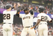  ?? Ezra Shaw / Getty Images ?? Pablo Sandoval homered in his first start of the season, off Felix Hernandez during the Giants’ three-homer fifth.