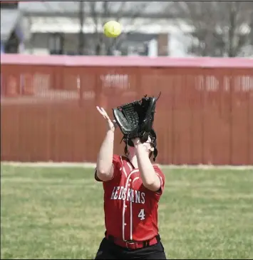  ?? Photo by John Zwez ?? Carlie Schroeder makes a catch for an out during Saturday’s season opener against Riverdale. See more photos at wapakdaily­news.com.
