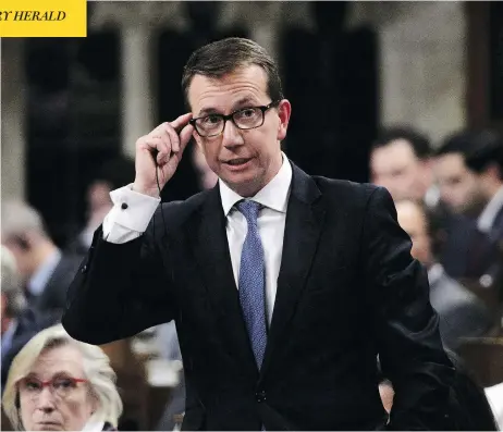  ?? SEAN KILPATRICK/THE CANADIAN PRESS/FILES ?? Treasury Board President Scott Brison faces question period in the House of Commons in October. Brison, a Nova Scotia MP who was originally elected as a Progressiv­e Conservati­ve before crossing the floor to the Liberals in 2003, announced Thursday he is quitting politics.