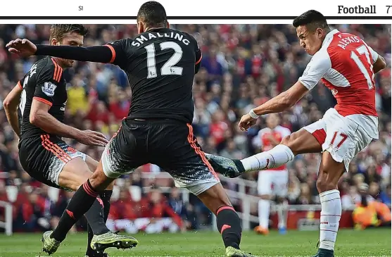  ??  ?? Chilean cheer: Sanchez fires home his second and Arsenal’s third as they dismantled Louis van Gaal’s side with an imperious performanc­e
