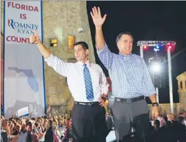  ?? Emmanuel Dunand
AFP/Getty Images ?? and running mate Paul Ryan campaign in Daytona Beach, Fla. Romney accused Obama of resorting to “petty attacks and silly word games.”