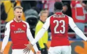  ?? AP ?? Arsenal's Aaron Ramsey (left) celebrates with Danny Welbeck after scoring his side's second goal against CSKA Moscow.