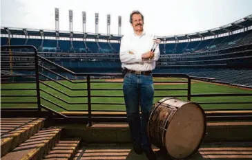  ?? David Ahntholz/New York Times 2007 ?? John Adams, a fixture at most Cleveland Indians (later Guardians) home games, first lugged a secondhand bass drum into the bleachers in the summer of 1973 and continued to rally fans for almost half a century.