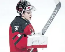  ?? THE CANADIAN PRESS FILES ?? Goaltender Carter Hart celebrates Team Canada’s victory over Sweden during the 2017 IIHF World Junior Championsh­ip semifinal on Jan. 4. Hart has been invited to Team Canada’s selection camp roster for the 2018 world juniors.