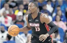  ?? JOHN RAOUX/AP ?? Heat big man Bam Adebayo has thrived with his proficient passing out of the post.