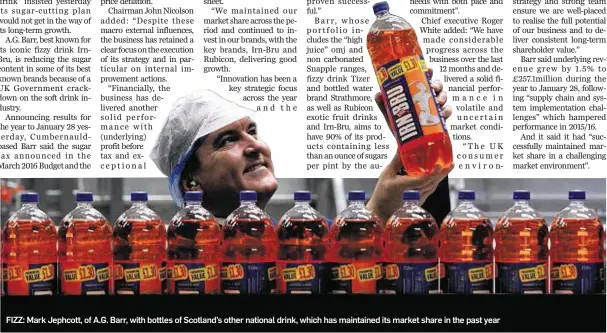  ??  ?? FIZZ: Mark Jephcott, of A.G. Barr, with bottles of Scotland’s other national drink, which has maintained its market share in the past year