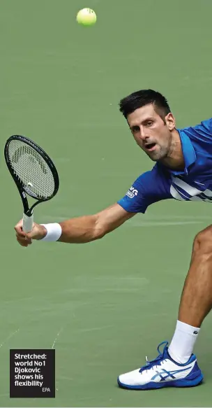  ?? EPA ?? Stretched: world No 1 Djokovic shows his flexibilit­y