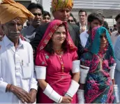  ?? — AP ?? Krishna Kumari ( centre), newly elected Senator of the Pakistani Hindu Community, arrives at the Parliament with her family members in Islamabad on Monday.