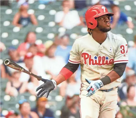  ?? BENNY SIEU/USA TODAY ?? Phillies centerfiel­der Odubel Herrera watches his solo home run in the ninth inning.