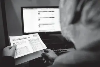  ?? Rich Addicks / New York Times ?? Prices for the most popular type of health insurance plan offered through the Affordable Care Act are expected to drop, and the number of insurers offering plans will increase next year.