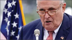  ?? The Associated Press ?? PERSONAL LAWYER: This Aug. 1, 2018, file photo shows Rudy Giuliani, an attorney for President Donald Trump, in Portsmouth, N.H. As Giuliani was pushing Ukrainian officials in the spring of 2019 to investigat­e one of Donald Trump’s main political rivals, a group of individual­s with ties to the president and his personal lawyer were also active in the former Soviet Republic.