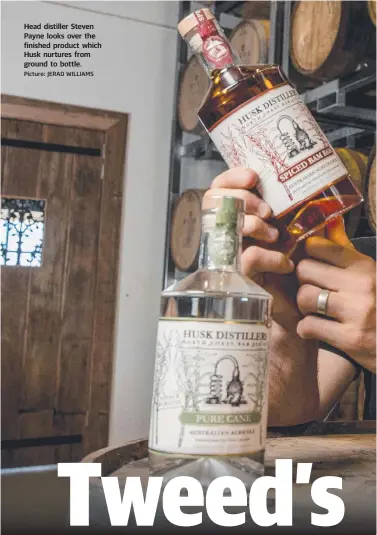  ?? Picture: JERAD WILLIAMS ?? Head distiller Steven Payne looks over the finished product which Husk nurtures from ground to bottle.