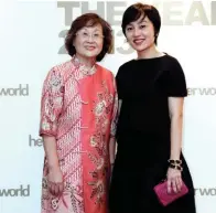  ??  ?? Our Woman of the Year 2013, Associate Professor Lim Swee Hia, and I at this year’s awards dinner.