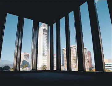  ?? Kirk McKoy Los Angeles Times ?? THE TIMES’ downtown spot let it keep a close eye on City Hall, seen from the 6th f loor Chandler apartment.