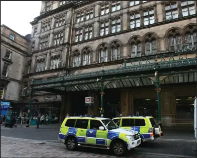  ??  ?? An increased police presence was evident to morning commuters using Glasgow’s Central Station