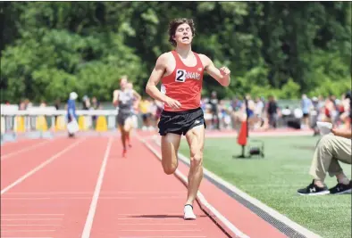  ?? Gregory Vasil / For Hearst Connecticu­t Media ?? Conard’s Gavin Sherry wins the 1,600-meter run with a new record during the State Open on Thursday.
