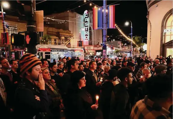  ?? Scott Strazzante/The Chronicle ?? Hundreds of members of the LGBTQ community and their supporters attend a vigil in San Francisco’s Castro district for victims of the Colorado Springs shooting.