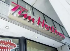  ?? THE CANADIAN PRESS FILES ?? Restaurant Brands Internatio­nal Inc., which own Tim Hortons and Burger King, doubled its fourth-quarter earnings.