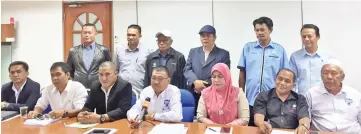  ??  ?? Arsit (seated fourth left) with the Pengasah committee members cum PNK chairmen at the press conference yesterday.