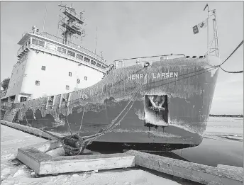  ?? BRIAN MCINNIS/SALTWIRE NETWORK ?? The Canadian Coast Guard Ship Henry Larsen is moored at the former coast guard wharf in Charlottet­own on Wednesday after the ship cut a path through the ice in the Charlottet­own harbour so the Irving Oil tanker Acadian could make it to the wharf to...