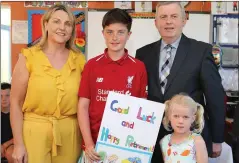  ??  ?? Left: Donal Murphy and Holly Breen making a presentati­on to Gerard from the pupils, with new Principal Marie Casey.