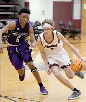  ?? Photos by Bud Sullins/Special to Siloam Sunday ?? Siloam Springs senior Breck Soderquist (above) drives to the basket as Fayettevil­le’s C.J. Williams defends on the play during Tuesday’s game at the Panther Activity Center. At right Siloam Springs senior Max Perkins goes up for a shot Tuesday as Fayettevil­le’s C.J. Williams defends during the Bulldogs’ 80-76 overtime win at Panther Activity Center.