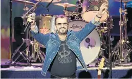  ?? SETH WENIG/AP ?? Ringo Starr plays as part of a concert celebratin­g the 50th anniversar­y of Woodstock.