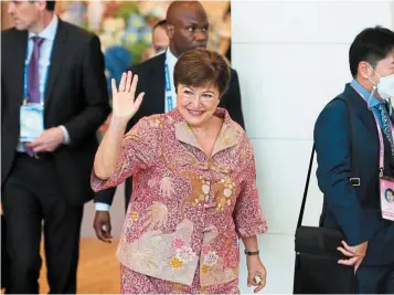  ?? ?? Sound advice: Georgieva waves as she arrives to attend the Apec summit in Bangkok. She wants Asian countries to work together to overcome fragmentat­ion in order to sustain growth. — AP