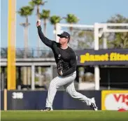  ?? David J. Phillip/Associated Press ?? New York Yankees pitcher Gerrit Cole throws during a spring training workout on Thursday in Tampa, Fla.