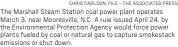  ?? CHRIS CARLSON, FILE - THE ASSOCIATED PRESS ?? The Marshall Steam Station coal power plant operates March 3, near Mooresvill­e, N.C. A rule issued April 24, by the Environmen­tal Protection Agency would force power plants fueled by coal or natural gas to capture smokestack emissions or shut down.