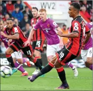  ??  ?? SPOT ON: Junior Stanislas fires home a penalty after Robert Snodgrass had brought down Callum Wilson