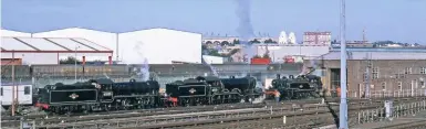  ?? JOHN HUNT ?? A view over Neasden that has changed almost beyond recognitio­n with the rebuilding of Wembley Stadium (and the loss of the iconic twin towers) and the demolition of the former steam shed. ‘K1’ No. 62005, ‘B12’ No. 61572 and ‘2MT’ No. 41312 bask in the morning May sun during the final ‘Steam on the Met’ event in 2000.