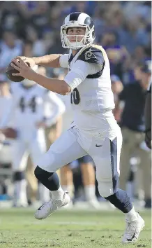  ?? SEAN M. HAFFEY/GETTY IMAGES ?? Los Angeles Rams quarterbac­k Jared Goff throws for a pass against the New Orleans Saints during the first quarter on Sunday in Los Angeles. Goff passed for 354 yards in the 26-20 win.