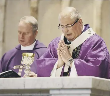  ??  ?? 0 Archbishop of Glasgow Philip Tartaglia leading a mass at St Andrew’s Cathedral in Glasgow