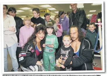  ??  ?? Gladiators Panther and Wolf at the Central Stores in Sunderland to open its Christmas toys department in 1994.