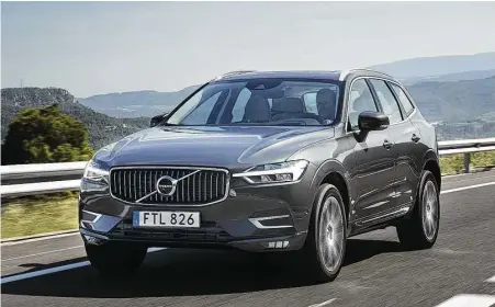  ?? Motor Matters photos ?? On the new XC60, three powertrain­s embrace the all-wheel drive and versions of the four-cylinder: 2.0-liter turbocharg­ed delivers 250 horsepower and 258 lb.-ft. of torque. Step up to the T6 and the four gets both turbocharg­ing and supercharg­ing for a...