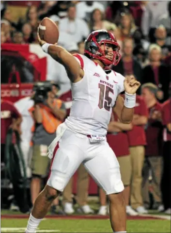  ?? AP Photo Gary Nova and Rutgers topped Arkansas on Saturday night and are subsequent­ly ranked No. 23 this week. ??