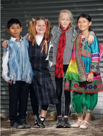  ?? Picture: PETER RISTEVSKI ?? CULTURES ON DISPLAY: Northern Bay Wexford campus students Sher Bwe Gay, Shayla Murray, Chiara Marshall and Nastaran Rahimi celebrate harmony day yesterday.