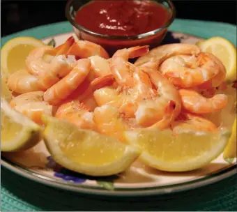  ?? TNS ?? PLATE O SHRIMP: Lemon-boiled shrimp come together quickly and can be served plain or with cocktail sauce.