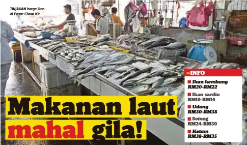  ??  ?? TINJAUAN harga ikan di Pasar Chow Kit.