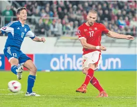  ??  ?? Switzerlan­d’s Pajtim Kasami, right, scores his side’s fifth goal.