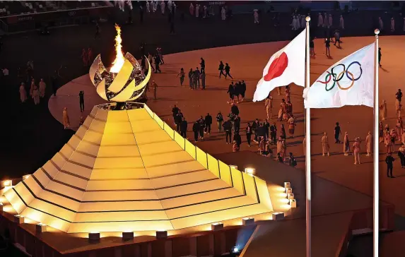  ?? Maja Hitij/Getty Images ?? The Olympic cauldron alight during the opening ceremony of the Tokyo 2020 Olympic Games at Olympic Stadium in Tokyo, Japan