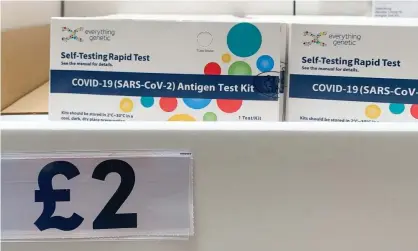  ?? Photograph: Maureen McLean/Rex/Shuttersto­ck ?? Covid tests for sale at £2 each in a Tesco branch in Taplow, Buckingham­shire, on Saturday.