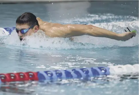  ??  ?? 0 Duncan Scott trains in Stirling yesterday as he prepares to swim for Team GB at the Glasgow 2018 European Championsh­ips.