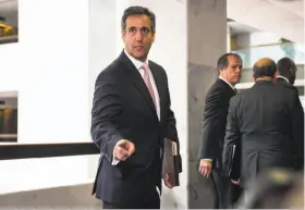  ?? Al Drago / New York Times 2017 ?? The FBI raided offices of Michael Cohen, President Trump’s personal lawyer, seen in 2017, who says he paid Stormy Daniels $130,000 from his own pocket.