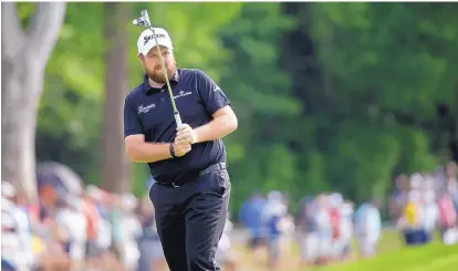  ?? JOHN MINCHILLO/ASSOCIATED PRESS ?? Shane Lowry watches his putt on the second hole during the third round of the U.S. Open golf championsh­ip at Oakmont Country Club on Saturday. He is the leader headed into the final day of play today.