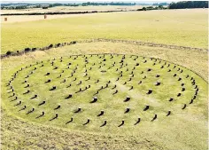  ?? ?? Posts mark the site of Woodhenge’s timber circles, first constructe­d around 2600 BC