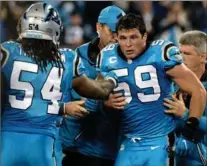  ?? JEFF SINER, TNS ?? Panthers linebacker Luke Kuechly is helped onto a cart after being injured in the fourth quarter against the New Orleans Saints Thursday night.