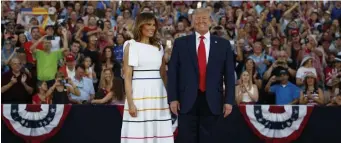  ?? AP ?? PARTY TIME: President Trump and first lady Melania arrive for an Independen­ce Day celebratio­n in front of the Lincoln Memorial on Thursday.