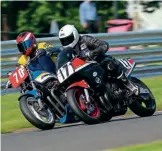  ??  ?? Danny Imberg (17,Yamaha FZ750) and Rob Wittey (70, PDQ Kawasaki 1170) hurtle side by side towards Cascades in the 1300 Classic/ Superbike/superstock­s event. Imberg was in terrific form all weekend on both the Superstock­er and Ducati 750, earning himself the Rider of the Meeting award for his efforts.